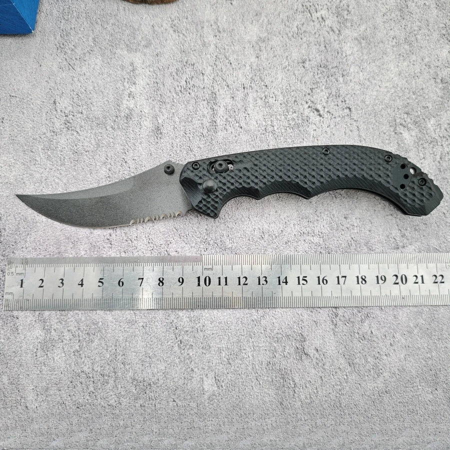 Curved-edge Folding Knife BM865 with D2 Blade and G10 Handle. A Man's Toy