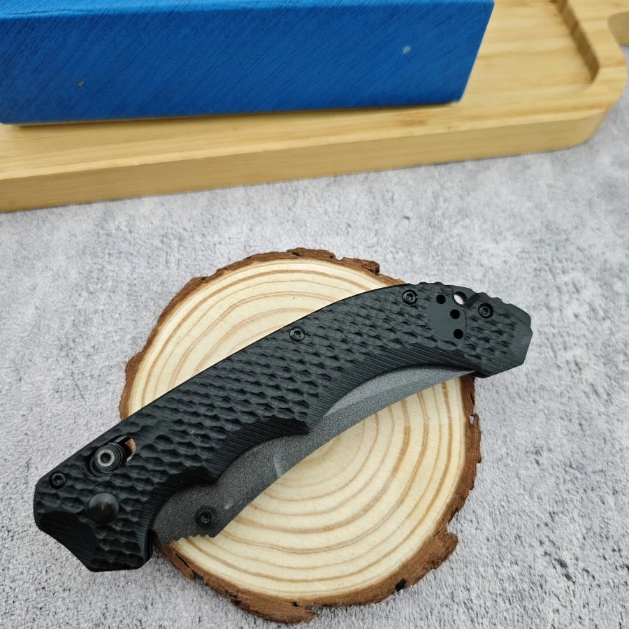 Curved-edge Folding Knife BM865 with D2 Blade and G10 Handle. A Man's Toy